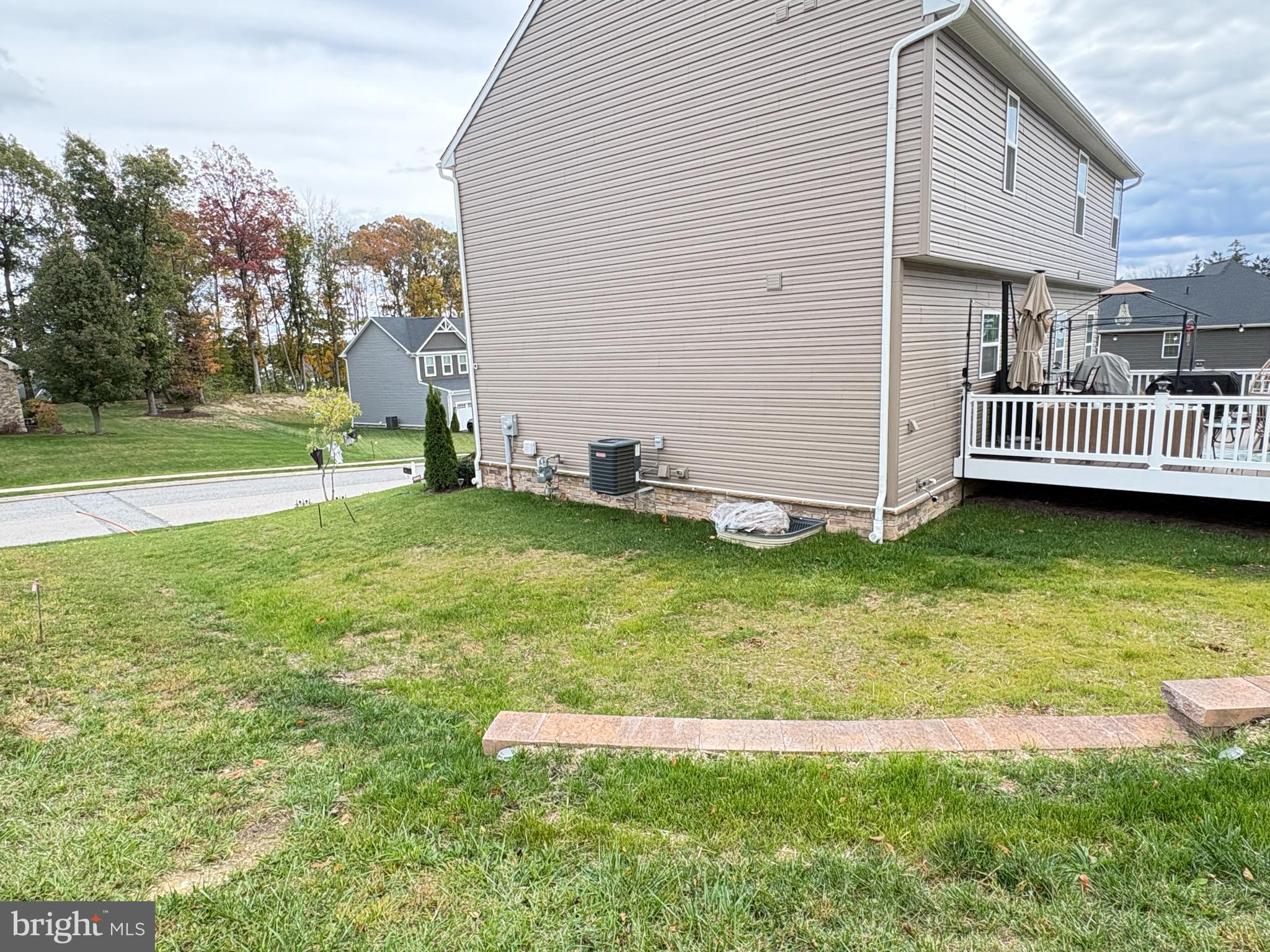 568 Monocacy Trail Spring Grove, PA 17362 - Photo 35 of 48 a view of a house with a yard and deck