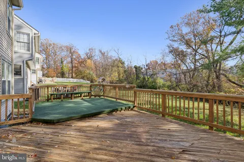 a view of a wooden floor with a yard