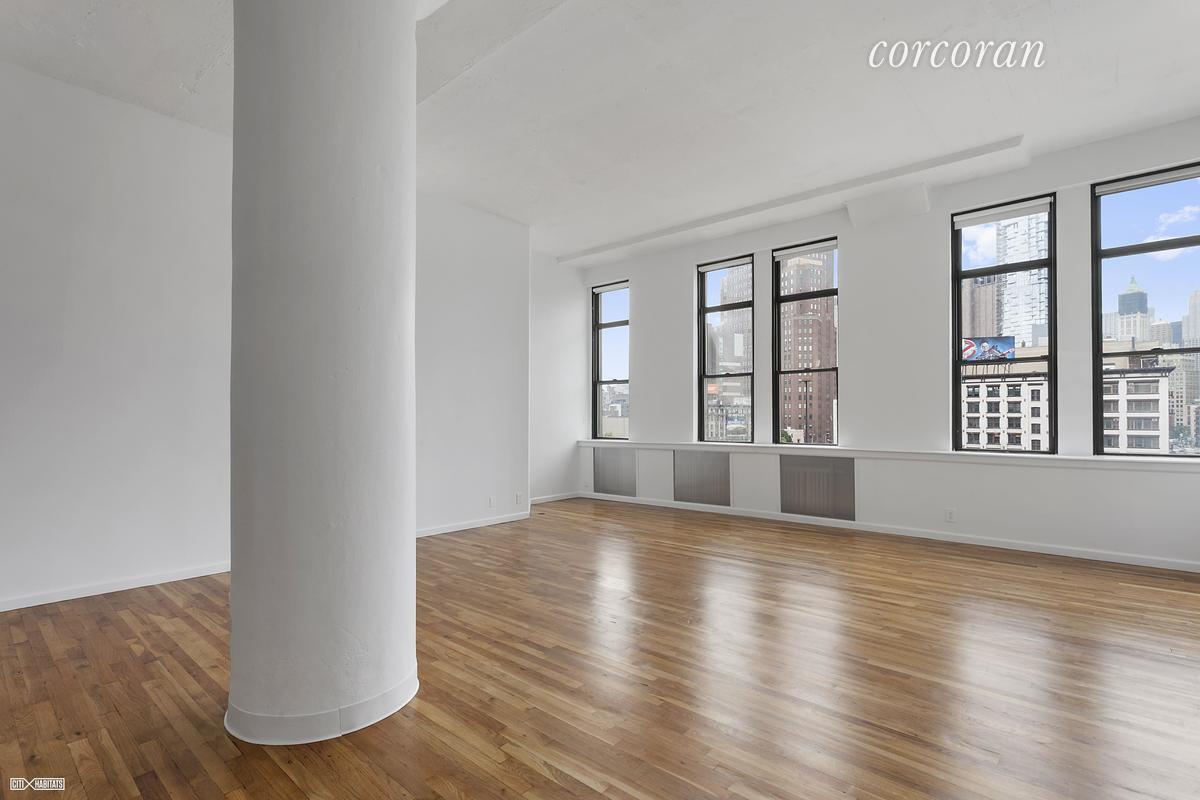 80 Varick Street, Unit 6D Manhattan, NY 10013 - Photo 1 of 1 a view of an empty room with wooden floor and a window