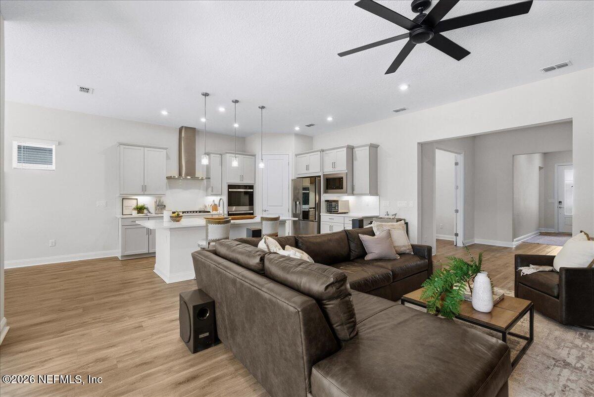 80 Ridgehill Way St. Johns, FL 32259 - Photo 12 of 60 a living room with furniture and kitchen view