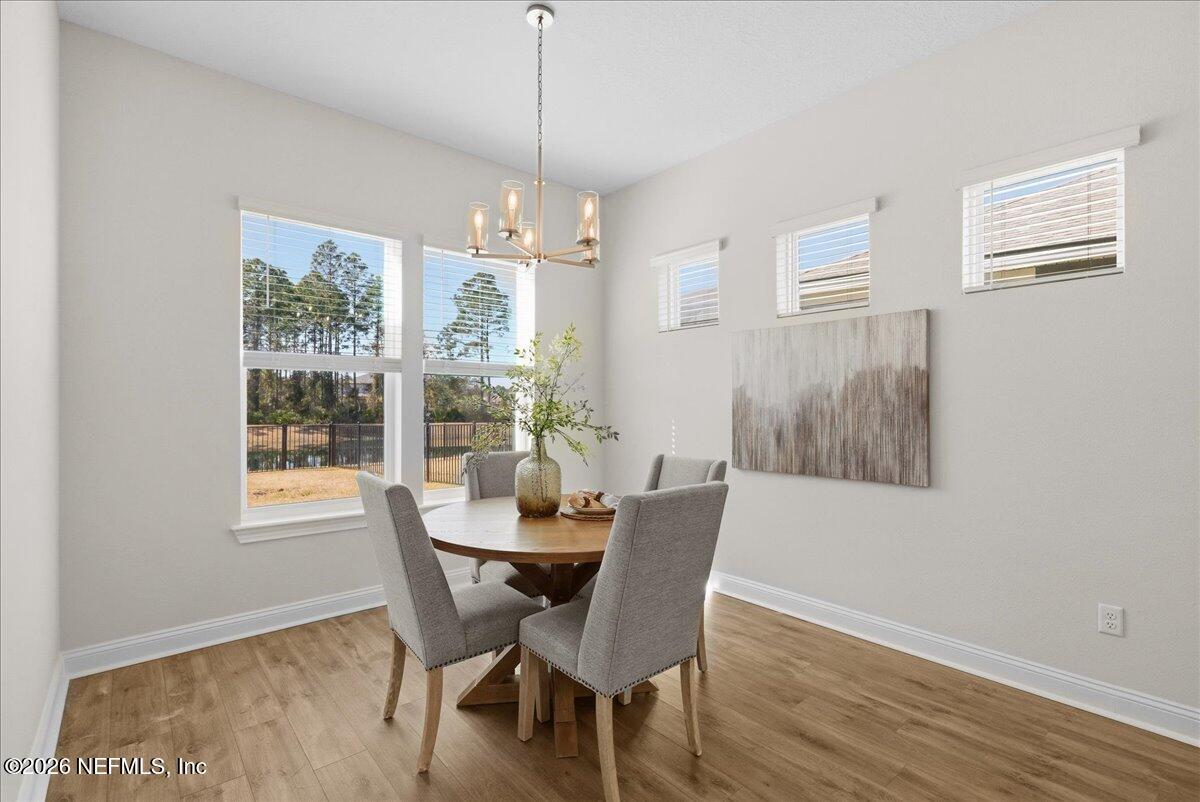 80 Ridgehill Way St. Johns, FL 32259 - Photo 19 of 60 a view of a dining room with furniture window and outside view