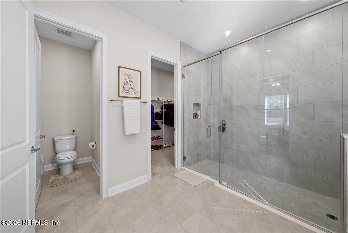 80 Ridgehill Way St. Johns, FL 32259 - Photo 24 of 60 a bathroom with a shower and a toilet