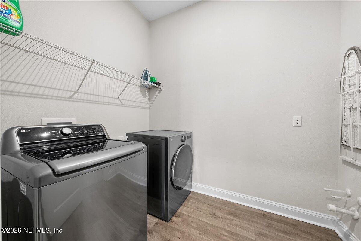 80 Ridgehill Way St. Johns, FL 32259 - Photo 35 of 60 a view of storage and utility room with racks on the wall