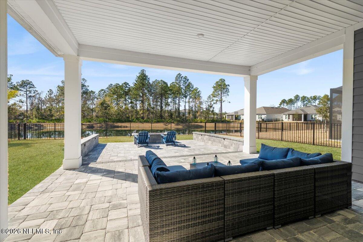 80 Ridgehill Way St. Johns, FL 32259 - Photo 38 of 60 a living room filled with couches and a table