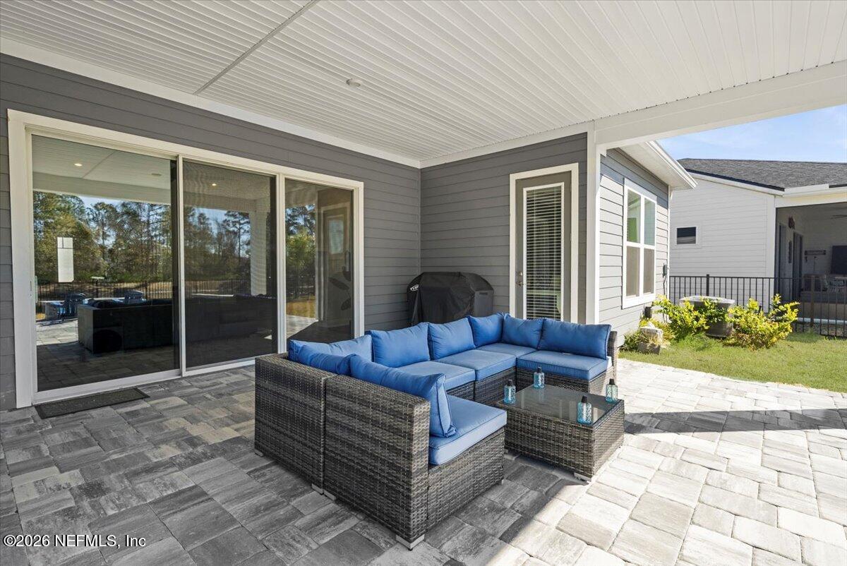 80 Ridgehill Way St. Johns, FL 32259 - Photo 39 of 60 a living room with furniture and a large window