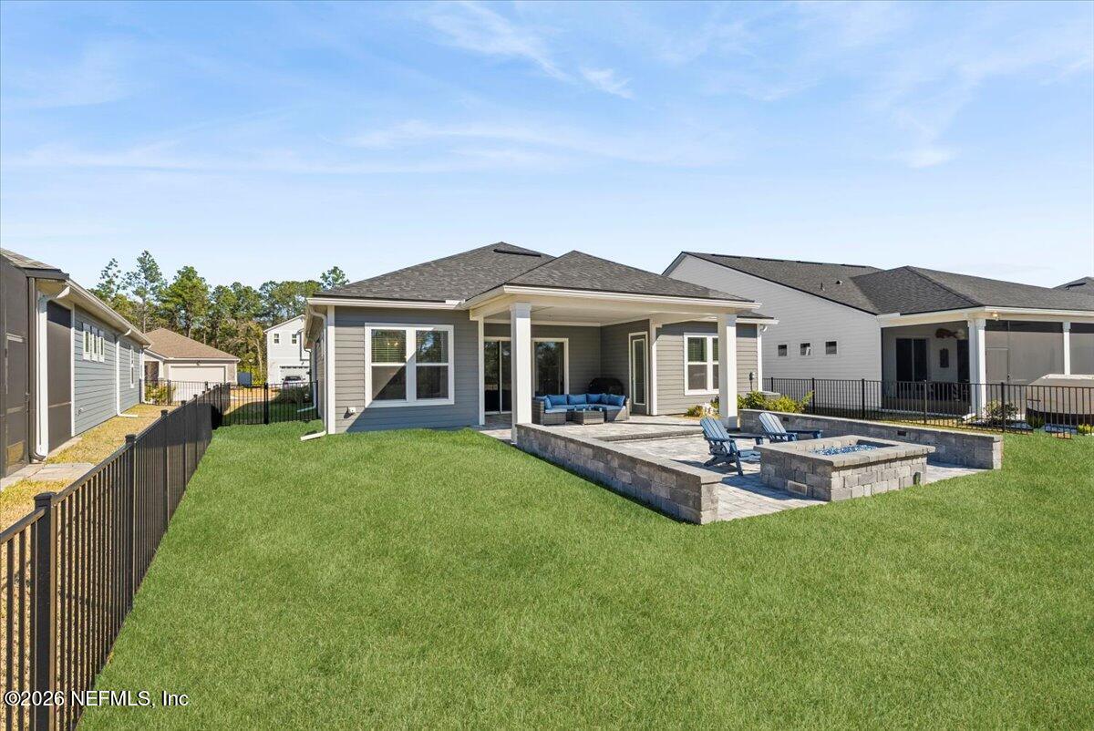 80 Ridgehill Way St. Johns, FL 32259 - Photo 43 of 60 a front view of a house with swimming pool having outdoor seating
