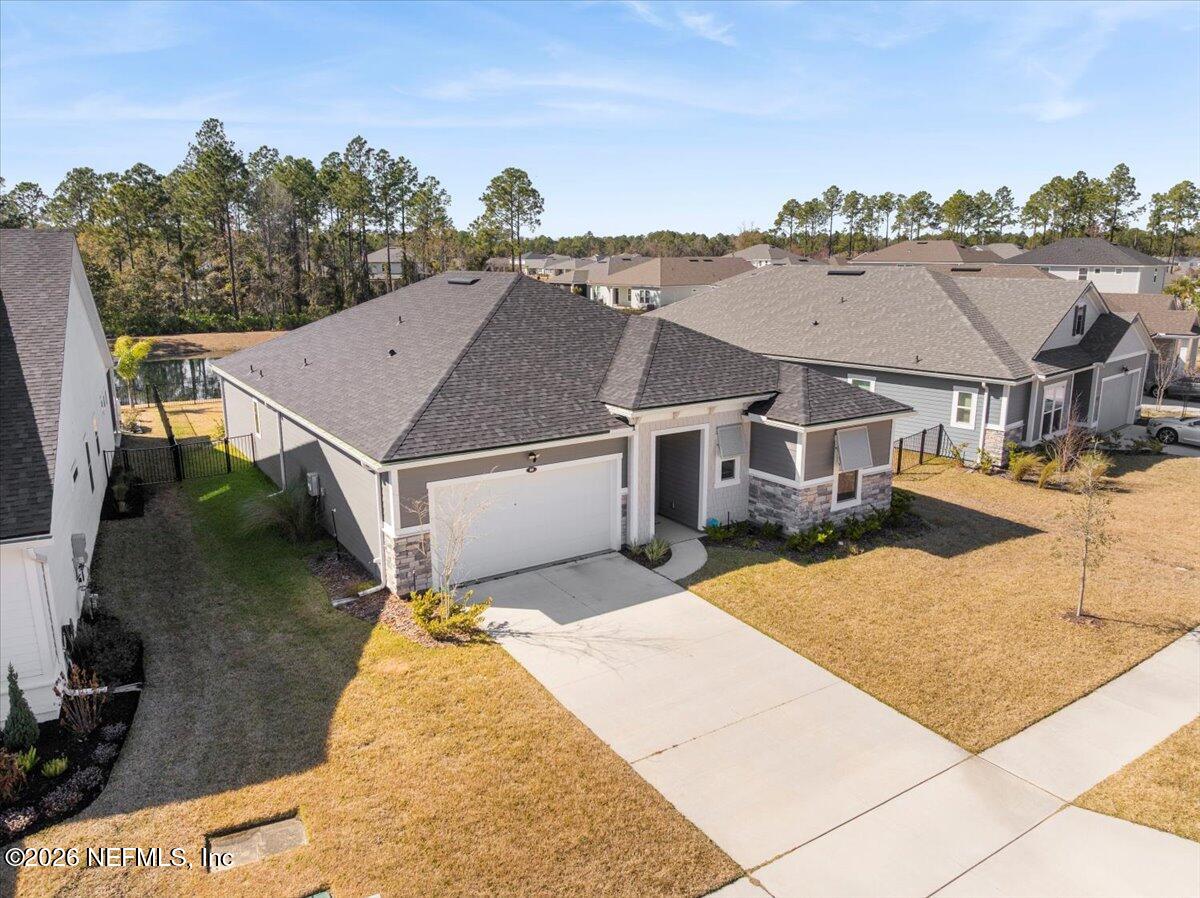 80 Ridgehill Way St. Johns, FL 32259 - Photo 49 of 60 a view of a house with a yard