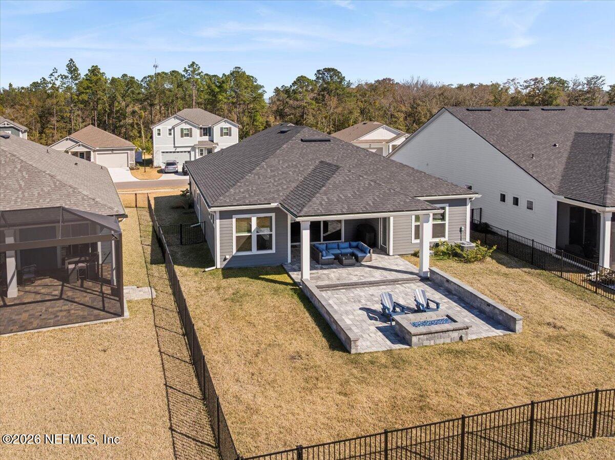 80 Ridgehill Way St. Johns, FL 32259 - Photo 53 of 60 a view of a house with pool and a yard