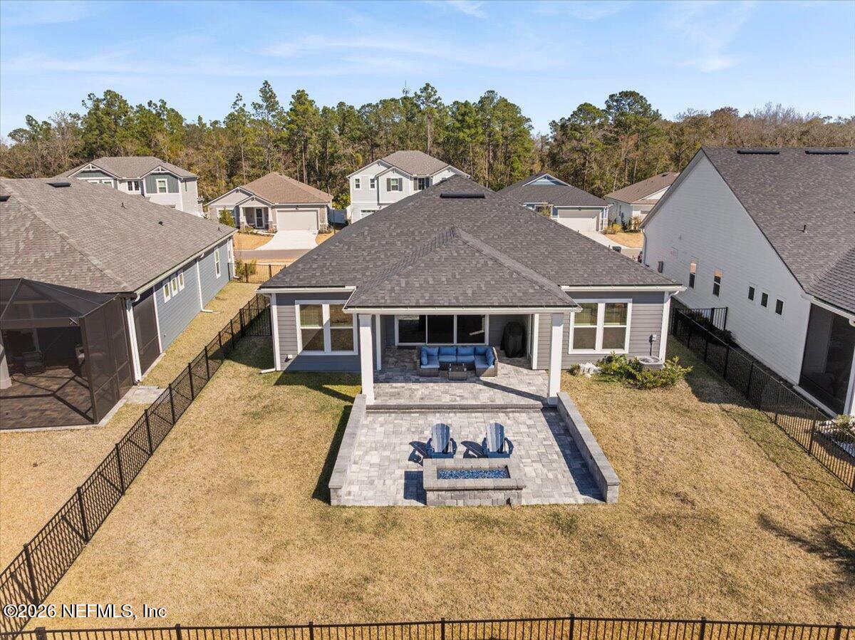 80 Ridgehill Way St. Johns, FL 32259 - Photo 54 of 60 a view of a white house with a big yard and large tree