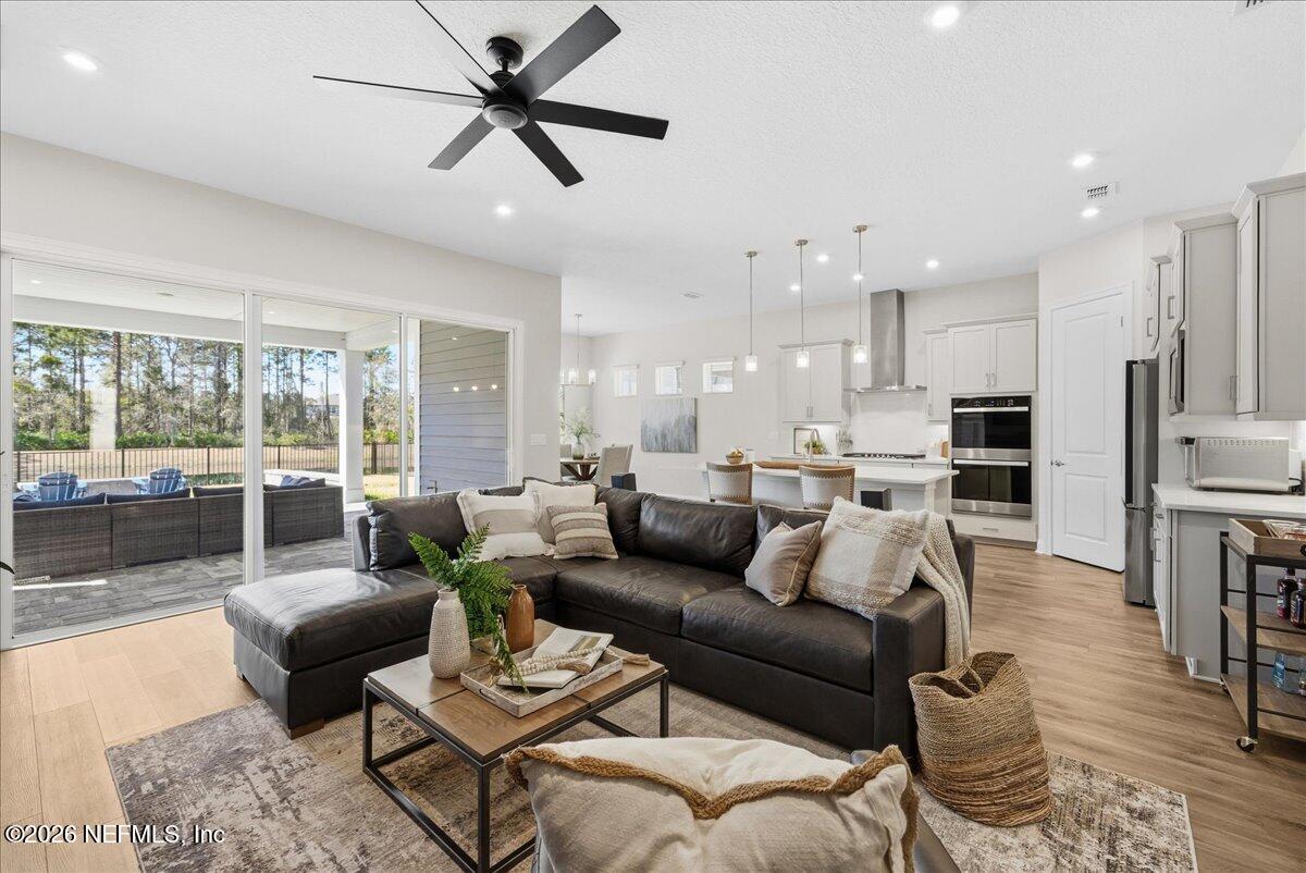 80 Ridgehill Way St. Johns, FL 32259 - Photo 8 of 60 a living room with furniture kitchen view and a large window