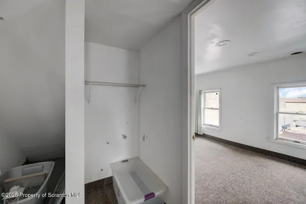 a view of kitchen and bathroom