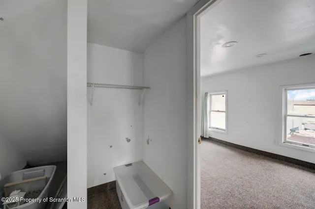 a view of kitchen and bathroom