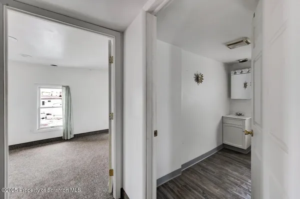 a view of room with bathroom