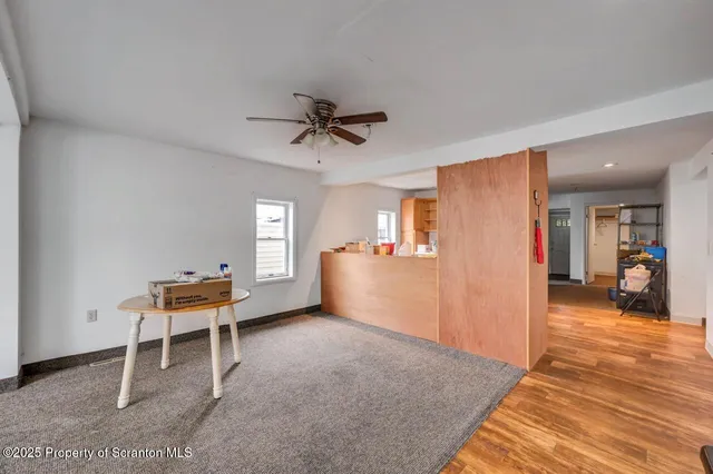 a workspace with furniture and window