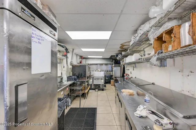 a workspace with furniture and screen