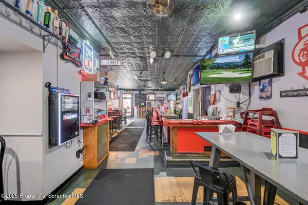 a view of a chairs and tables in patio