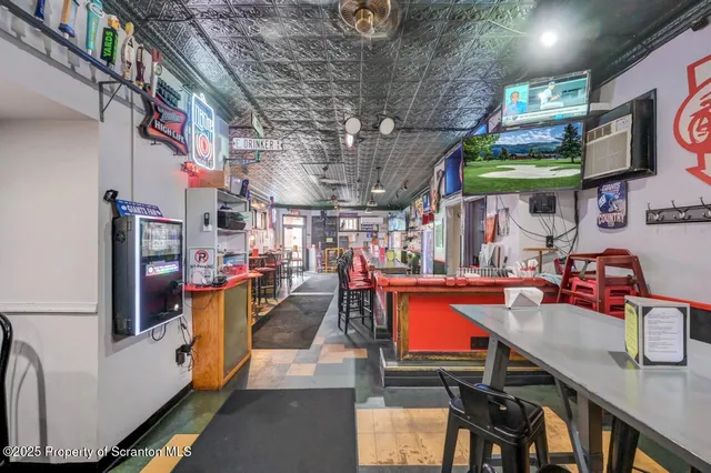 a view of a chairs and tables in patio
