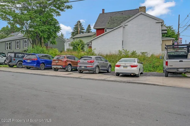 a car parked in front of a house