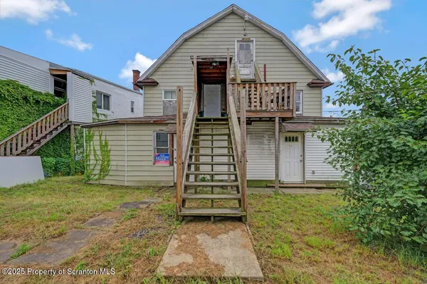 a front view of house with yard