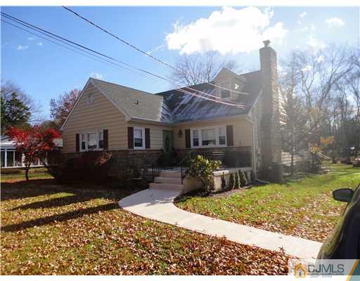 6 Lawton Road Bridgewater, NJ 08807 - Photo 1 of 25 a front view of a house with garden