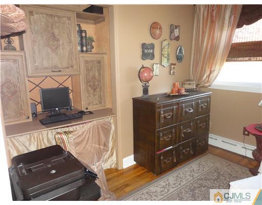 6 Lawton Road Bridgewater, NJ 08807 - Photo 19 of 25 a room with cabinets and window
