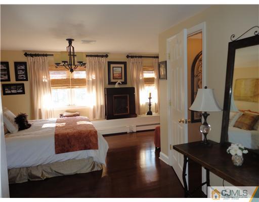 6 Lawton Road Bridgewater, NJ 08807 - Photo 20 of 25 a bedroom with a bed window and couch