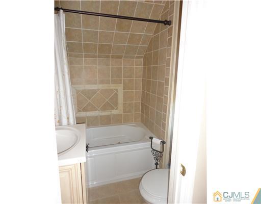 6 Lawton Road Bridgewater, NJ 08807 - Photo 22 of 25 a bathroom with a toilet and a shower