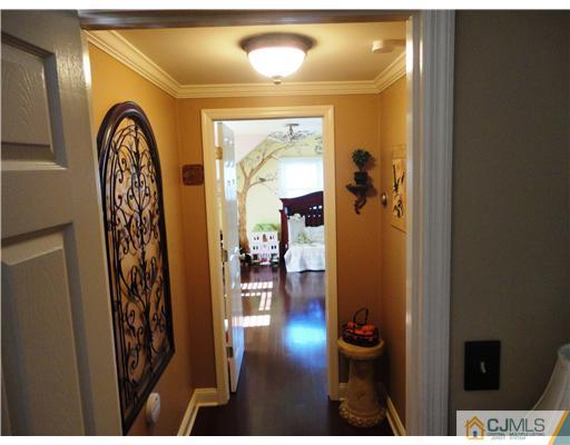 6 Lawton Road Bridgewater, NJ 08807 - Photo 23 of 25 a view of a hallway with a livingroom