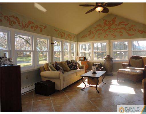 6 Lawton Road Bridgewater, NJ 08807 - Photo 5 of 25 a living room with furniture and a large window