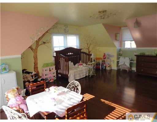 6 Lawton Road Bridgewater, NJ 08807 - Photo 8 of 25 a dining room with table and chairs