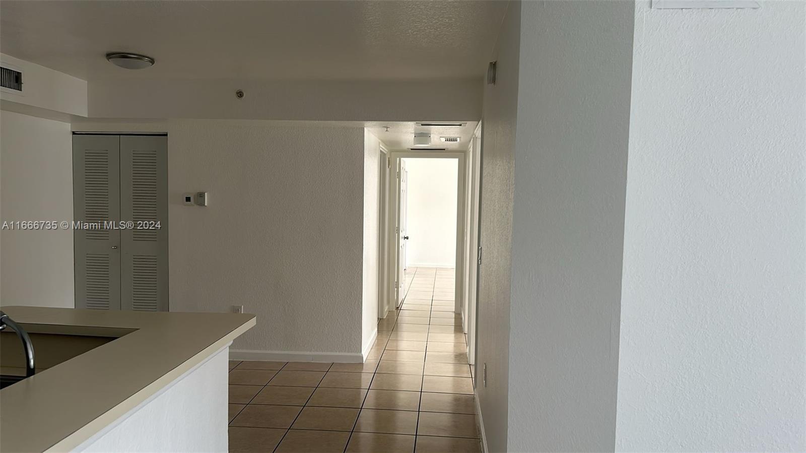 15430 Southwest 284th Street, Unit 6202 Homestead, FL 33033 - Photo 2 of 17 a bathroom with a bathtub