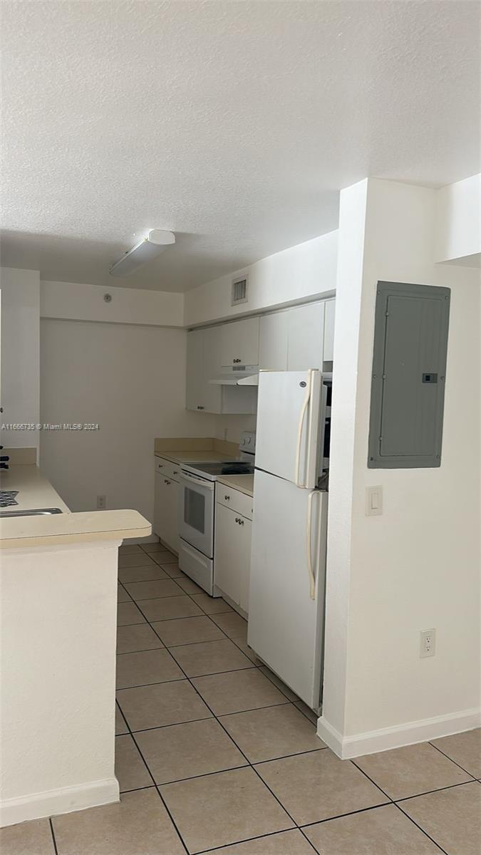 15430 Southwest 284th Street, Unit 6202 Homestead, FL 33033 - Photo 4 of 17 a utility room with dryer and washer