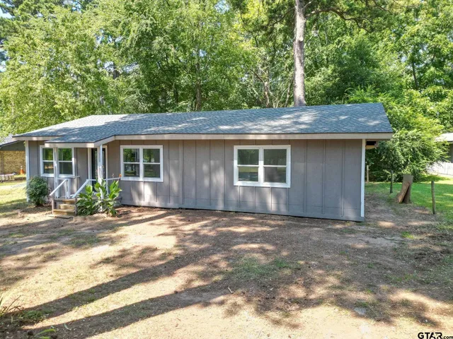 a view of a house with a patio