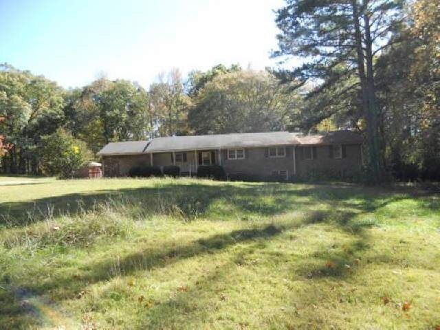 227 Lee Maddox Road Jackson, GA 30233 - Photo 1 of 1 a view of swimming pool with a yard