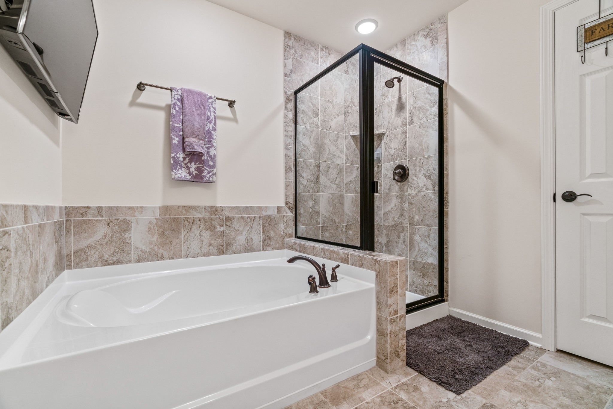 1432 Old Stone Road Lebanon, TN 37087 - Photo 33 of 55 a spacious bathroom with a bathtub and shower