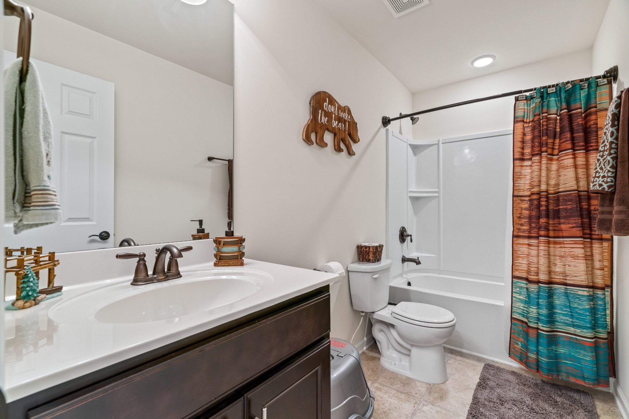 1432 Old Stone Road Lebanon, TN 37087 - Photo 40 of 55 a bathroom with a sink a toilet and shower