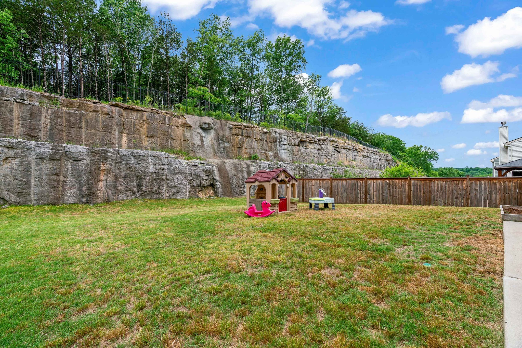 1432 Old Stone Road Lebanon, TN 37087 - Photo 49 of 55 a view of a backyard with a small cabin and wooden fence