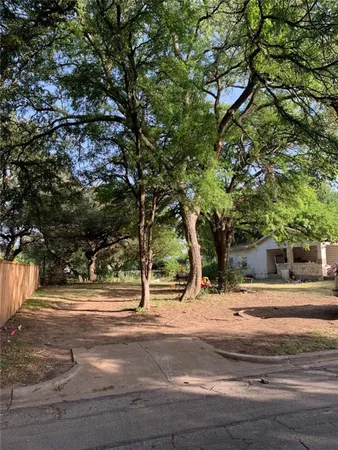a view of street with houses