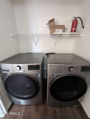 a utility room with dryer and washer