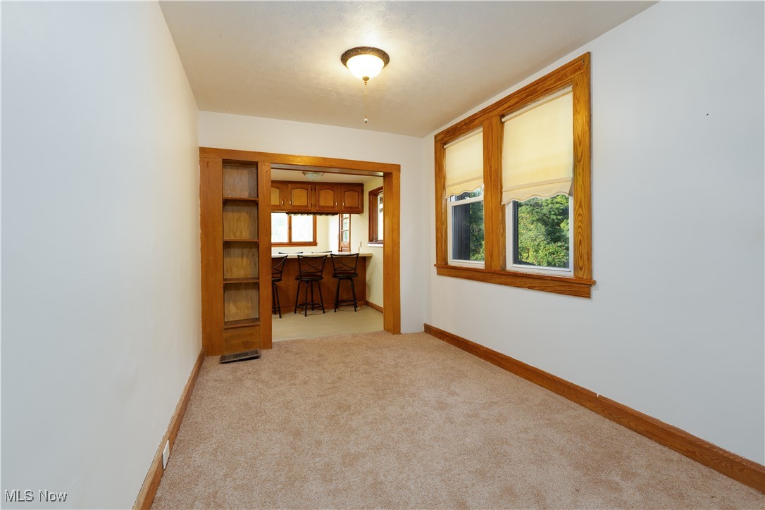 4491 Fox Road Kingsville, OH 44048 - Photo 15 of 33 Spare room featuring light carpet