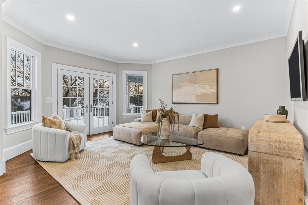 6 Lakeview Road Winchester, MA 01890 - Photo 16 of 42 a living room with furniture and a flat screen tv
