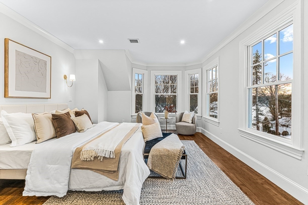 6 Lakeview Road Winchester, MA 01890 - Photo 19 of 42 a bedroom with a large bed and a couch