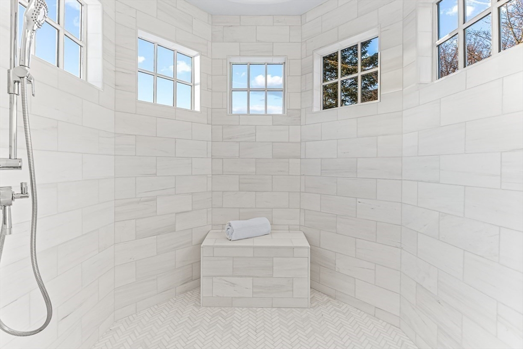 6 Lakeview Road Winchester, MA 01890 - Photo 23 of 42 a bathroom with a white bathtub