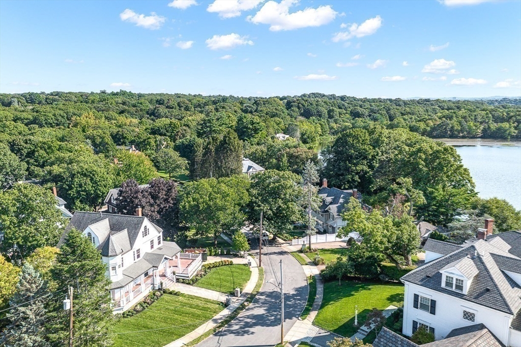 6 Lakeview Road Winchester, MA 01890 - Photo 40 of 42 an aerial view of a house with a yard and lake view
