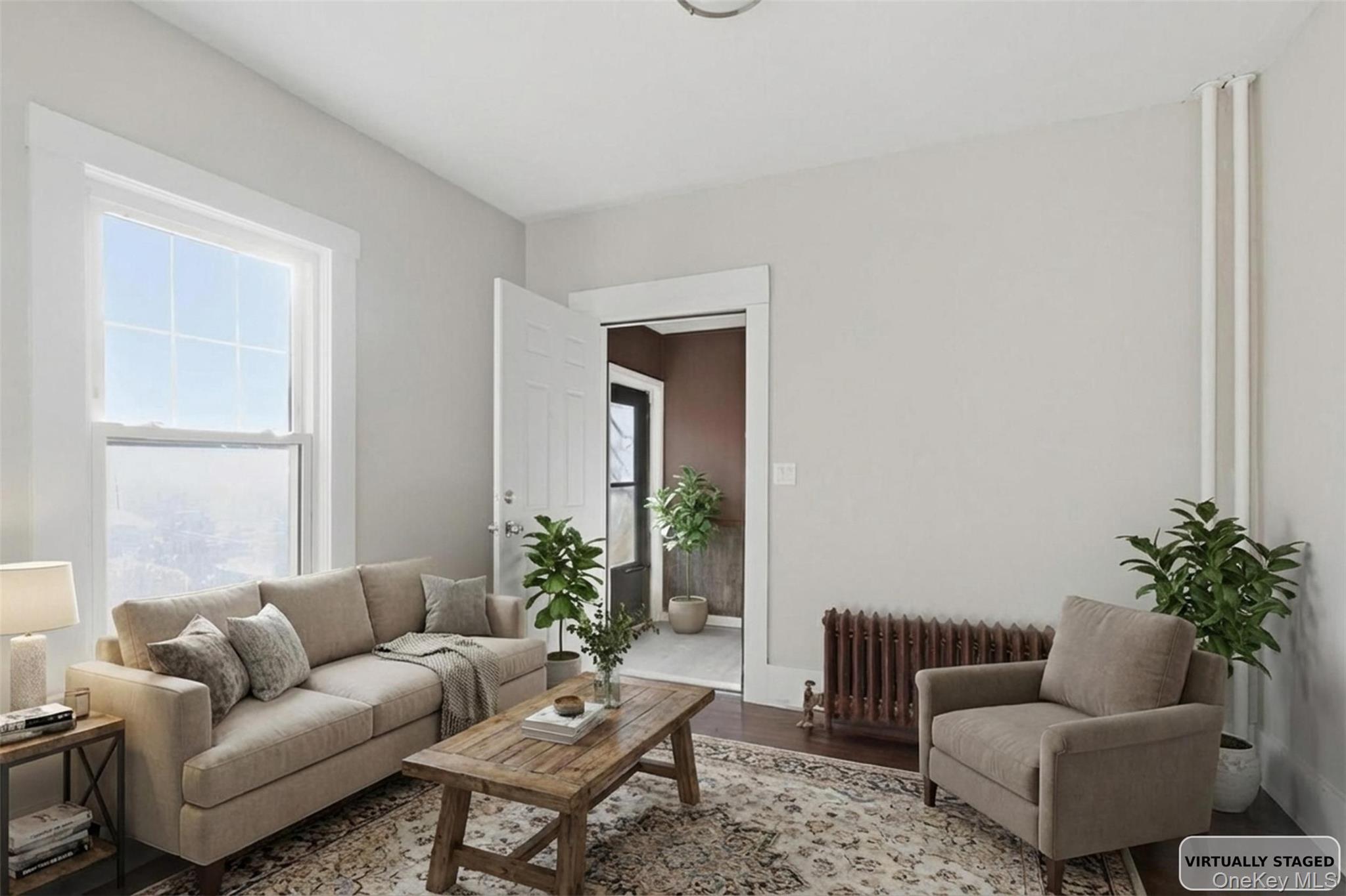 3 Hamilton Avenue Ossining, NY 10562 - Photo 13 of 48 a living room with furniture and a potted plant