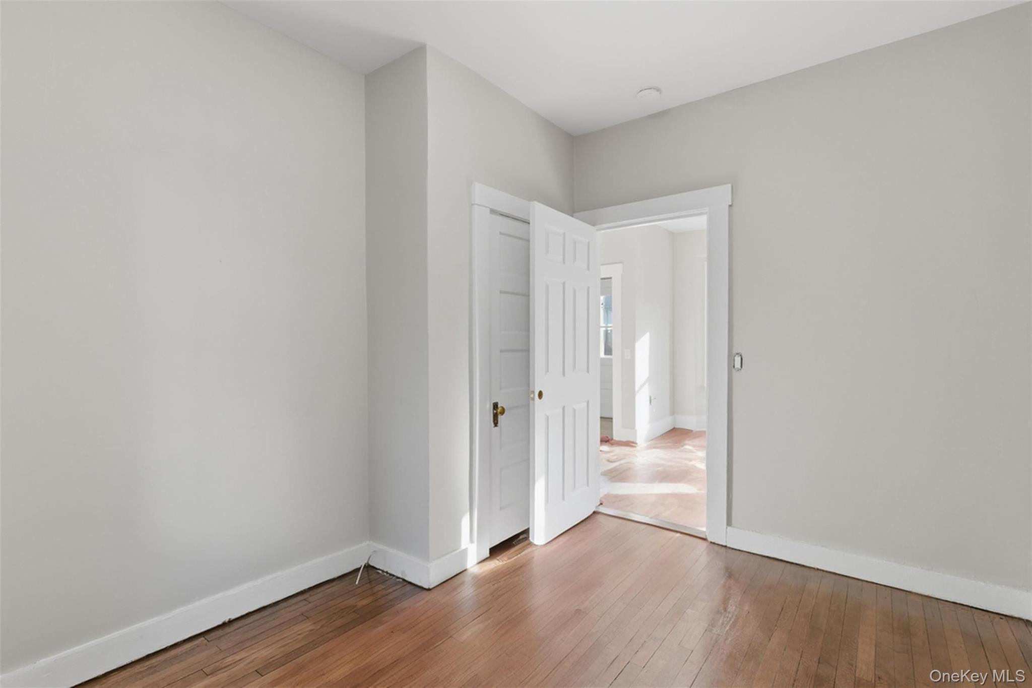 3 Hamilton Avenue Ossining, NY 10562 - Photo 19 of 48 a view of an empty room and wooden floor