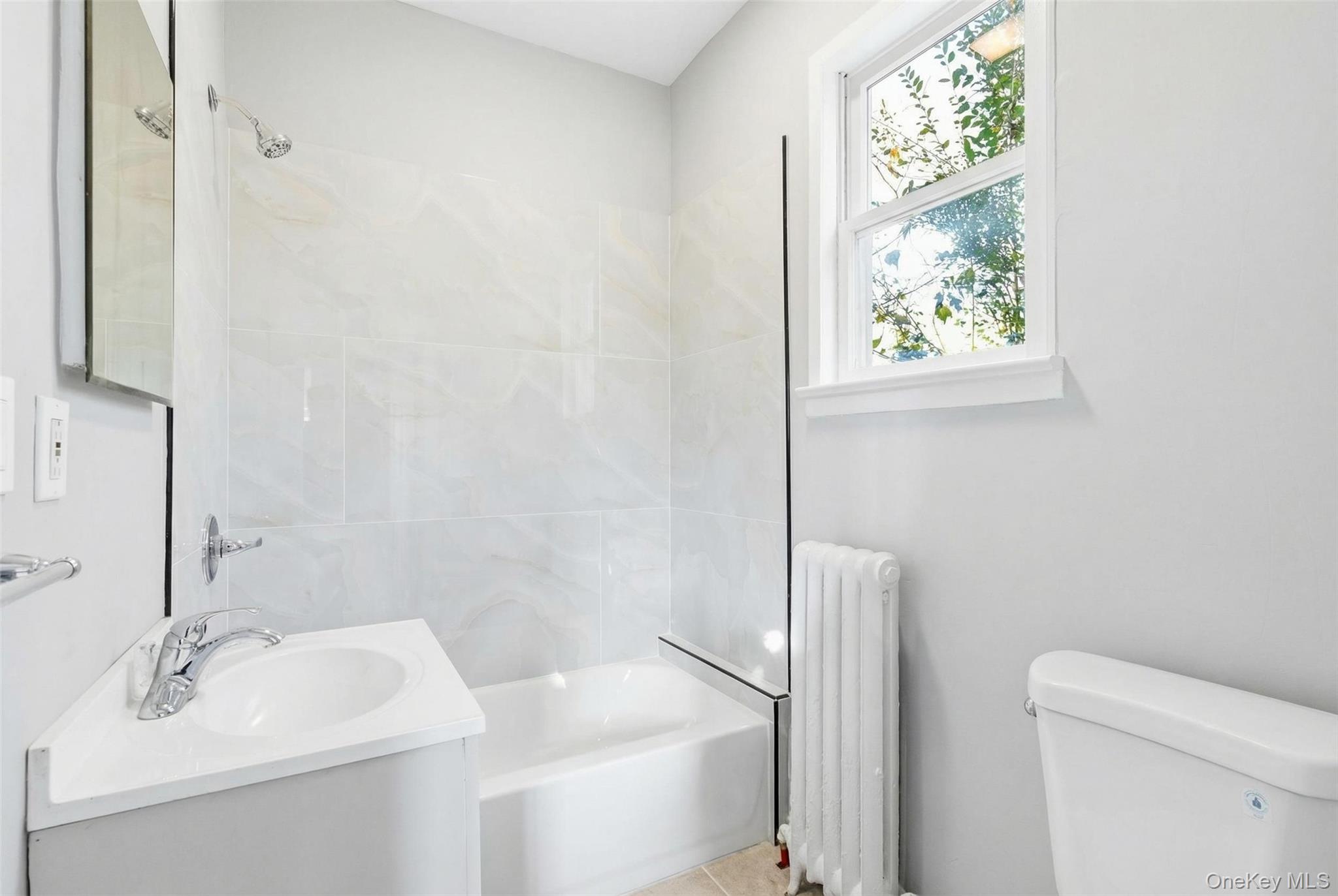 3 Hamilton Avenue Ossining, NY 10562 - Photo 21 of 48 a bathroom with a sink and a toilet