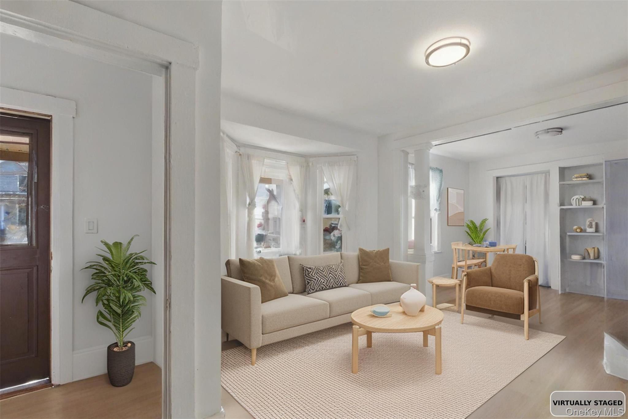 3 Hamilton Avenue Ossining, NY 10562 - Photo 24 of 48 a living room with furniture and a potted plant