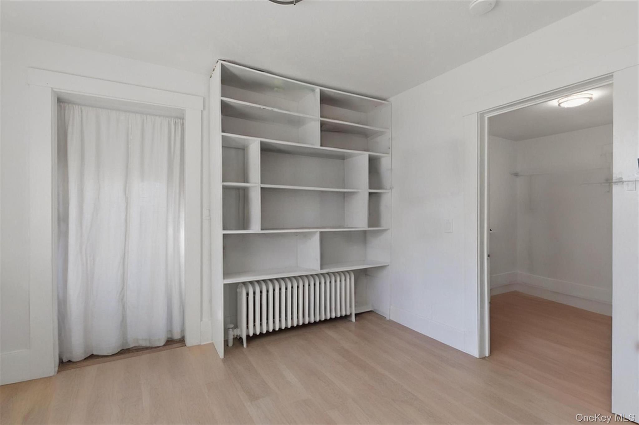 3 Hamilton Avenue Ossining, NY 10562 - Photo 31 of 48 a view of a room with empty shelves