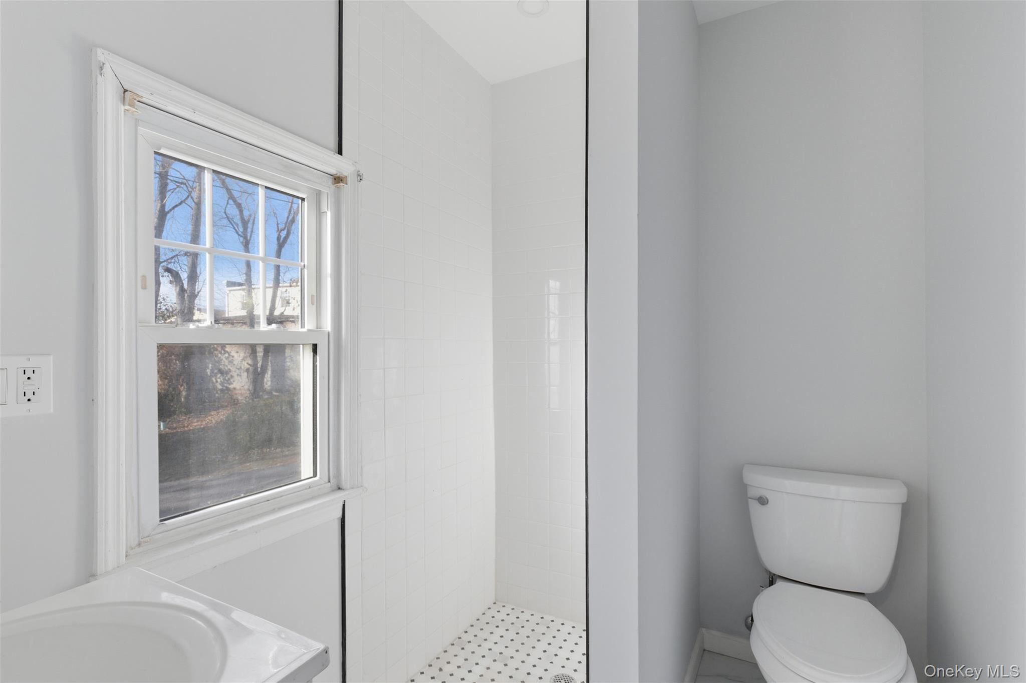 3 Hamilton Avenue Ossining, NY 10562 - Photo 40 of 48 a bathroom with a toilet and a shower